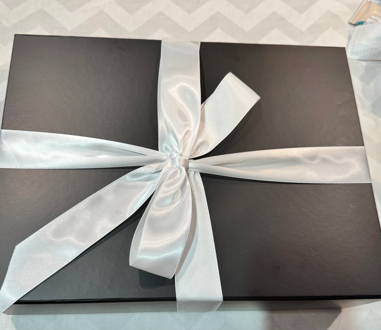Everpaw memorial gift box with white ribbon